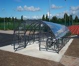 Harlan style 12 lockable closed compound cycle shelter for 40 bikes, with bespoke dividing partition