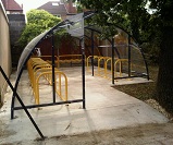 FS56 - Harlan style 12 cycle shelters for 26 bikes, with additional storage for 20 scooters, two colour powder coat finish